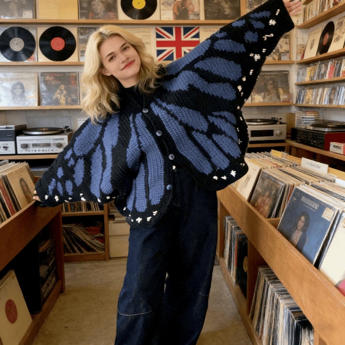 Christmas Monarch Butterfly Knit Cardigan featuring festive holiday-themed butterfly patterns and cozy knit fabric.