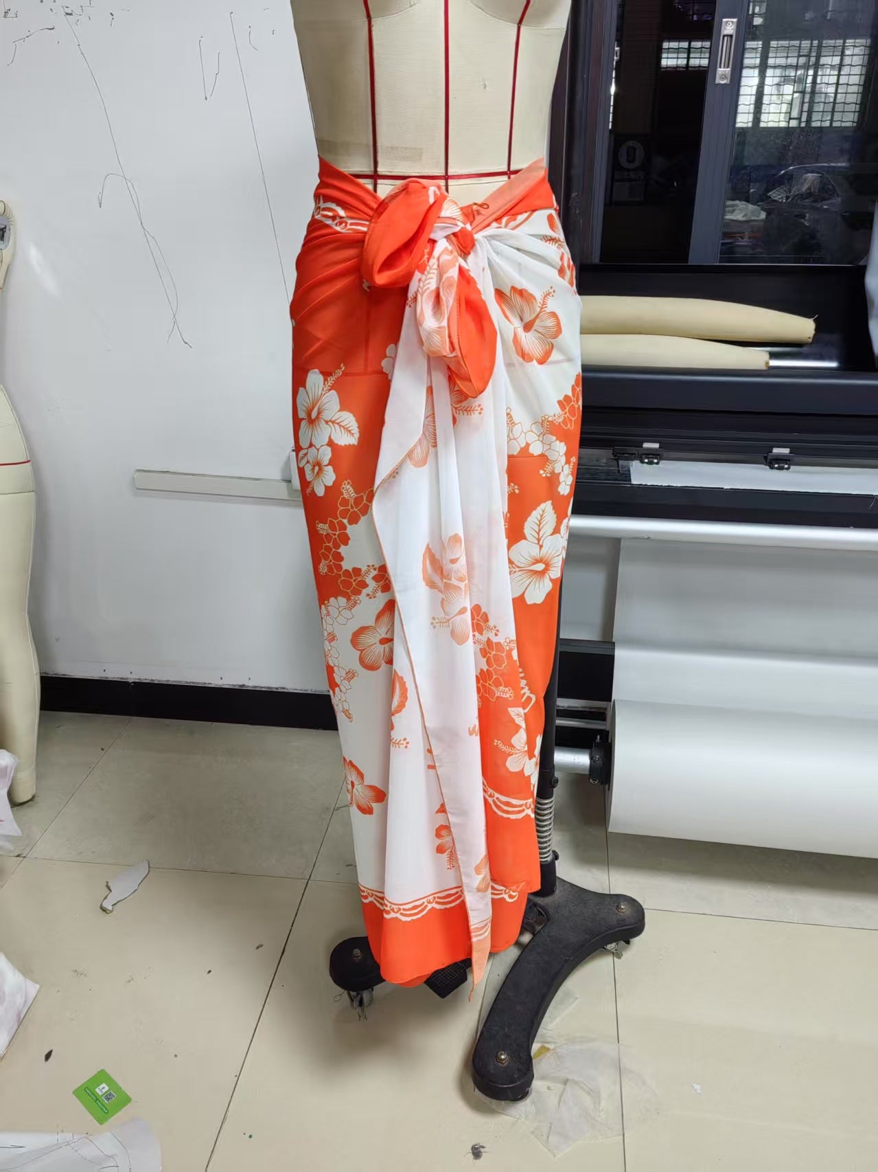 Women’s floral print chiffon beach skirt by CHRISTMAS, lightweight and flowy with vibrant floral patterns, perfect for summer outings.