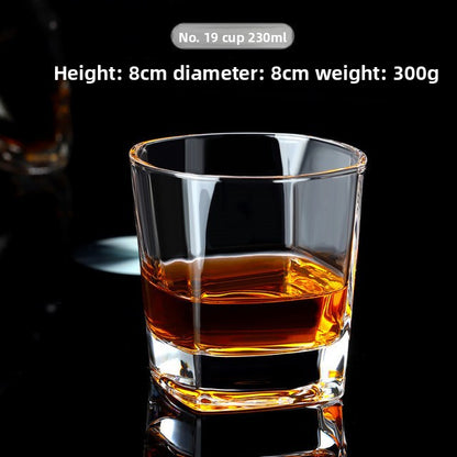 Clear glass whiskey cup with festive Christmas design, ideal for holiday gatherings and celebrations.