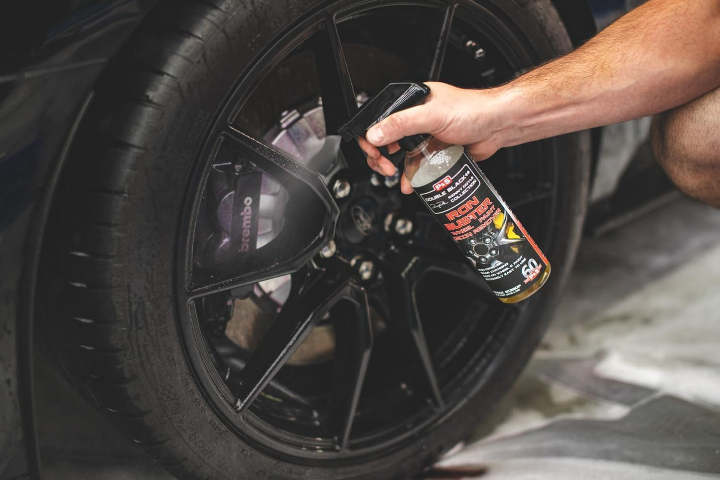 Urbanomax Iron Buster Pro safe wheel and paint iron remover in 100 ml bottle, designed for automotive detailing and cleaning.