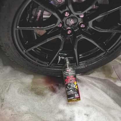 Urbanomax Iron Buster Pro safe wheel and paint iron remover in a 100 ml bottle, used for cleaning and detailing vehicles.