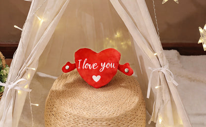 URBANOMAX CuddleHeart™ Music Toy showing soft plush fabric with musical controls and heart-shaped design for children.