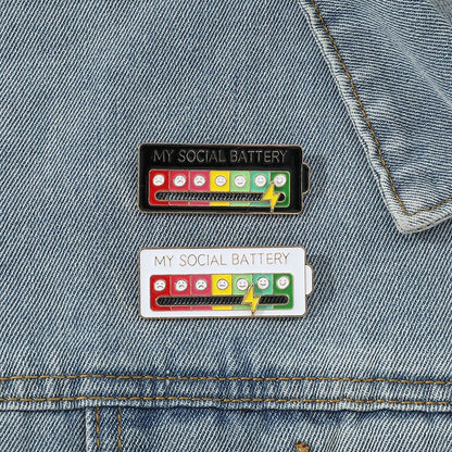 Christmas Social Battery Pin™ featuring festive holiday design and branding, perfect for Christmas accessories and seasonal wear.