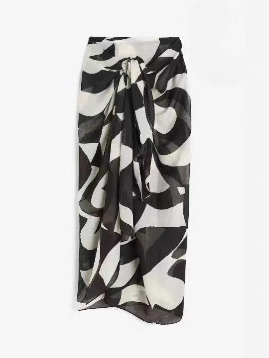 Women's floral print chiffon beach skirt by CHRISTMAS, lightweight and flowy, perfect for summer and beachwear.