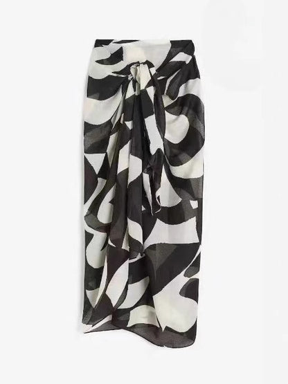 Women's floral print chiffon beach skirt by CHRISTMAS, lightweight and flowy, perfect for summer and beachwear.