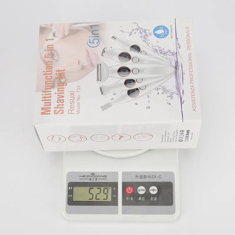 URBANOMAX Urbanomax 5-in-1 women’s hair removal device with multiple attachments for smooth, hair-free skin.