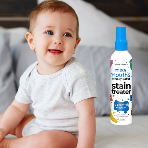 Christmas Urbanomax™ multi-purpose cleaner bottle with Christmas-themed label, suitable for cleaning various surfaces.