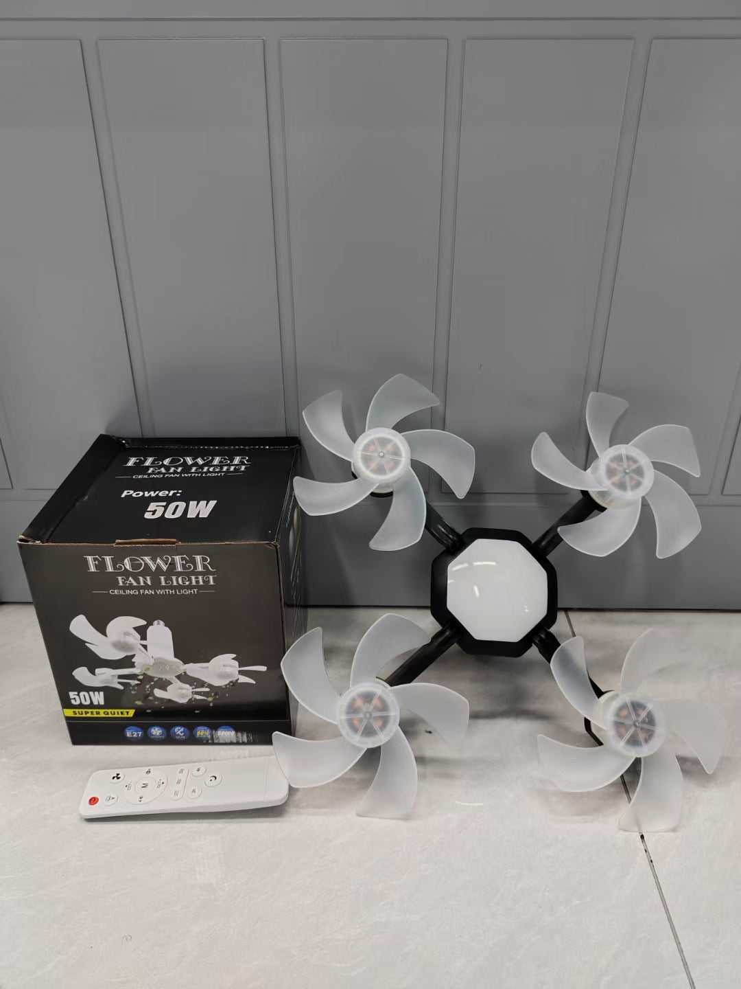 URBANOMAX remote control ceiling fan with integrated light, modern design, white finish, and four blades for home cooling.