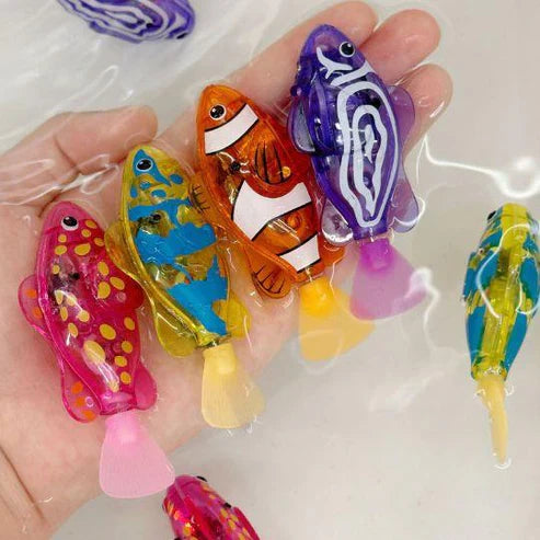 Colorful Magic Swimming Fish with Lights set by URBANOMAX, featuring four plush fish with glowing lights for kids' play and decor.