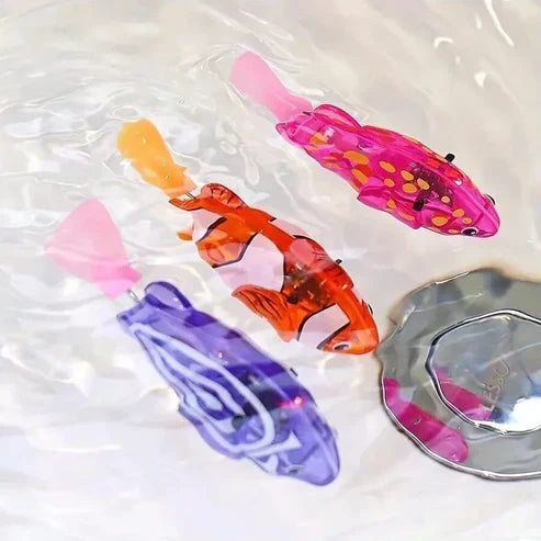 Colorful URBANOMAX Magic Swimming Fish with Lights set of 4, featuring vibrant fish toys with LED lights for kids' play.
