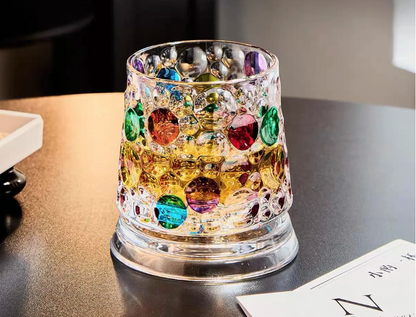 Dancing wine glass by CHRISTMAS, featuring an elegant design with a whimsical dance motif on a clear glass surface.