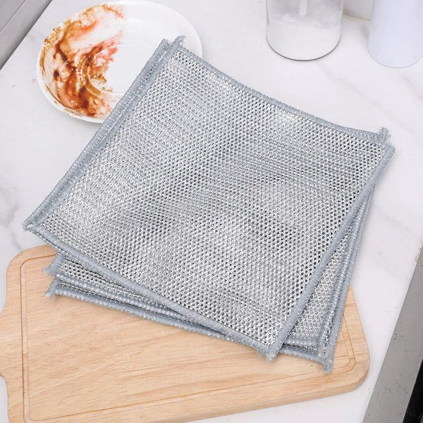 UrbanOMAX EcoSleek cleaning cloth shown in a hand, highlighting its soft, eco-friendly fabric for effective cleaning.