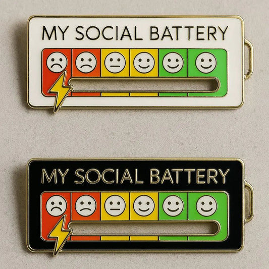 Urbanomax Social Battery Pin™ Christmas enamel pin featuring a festive holiday design on a white background.
