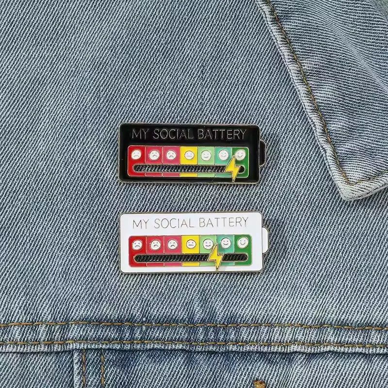 Urbanomax Social Battery Pin™ Christmas-themed decorative pin featuring a festive design, perfect for holiday accessories.