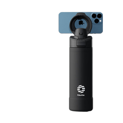 Magnetic insulated sports water bottle with phone holder, featuring a sleek design and vibrant Christmas-themed colors.