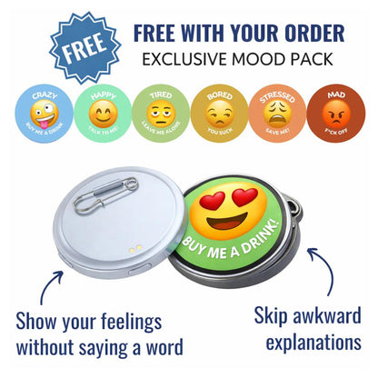 Urbanomax Mood Badge featuring vibrant design and branding, small round accessory with colorful graphic on a white background.