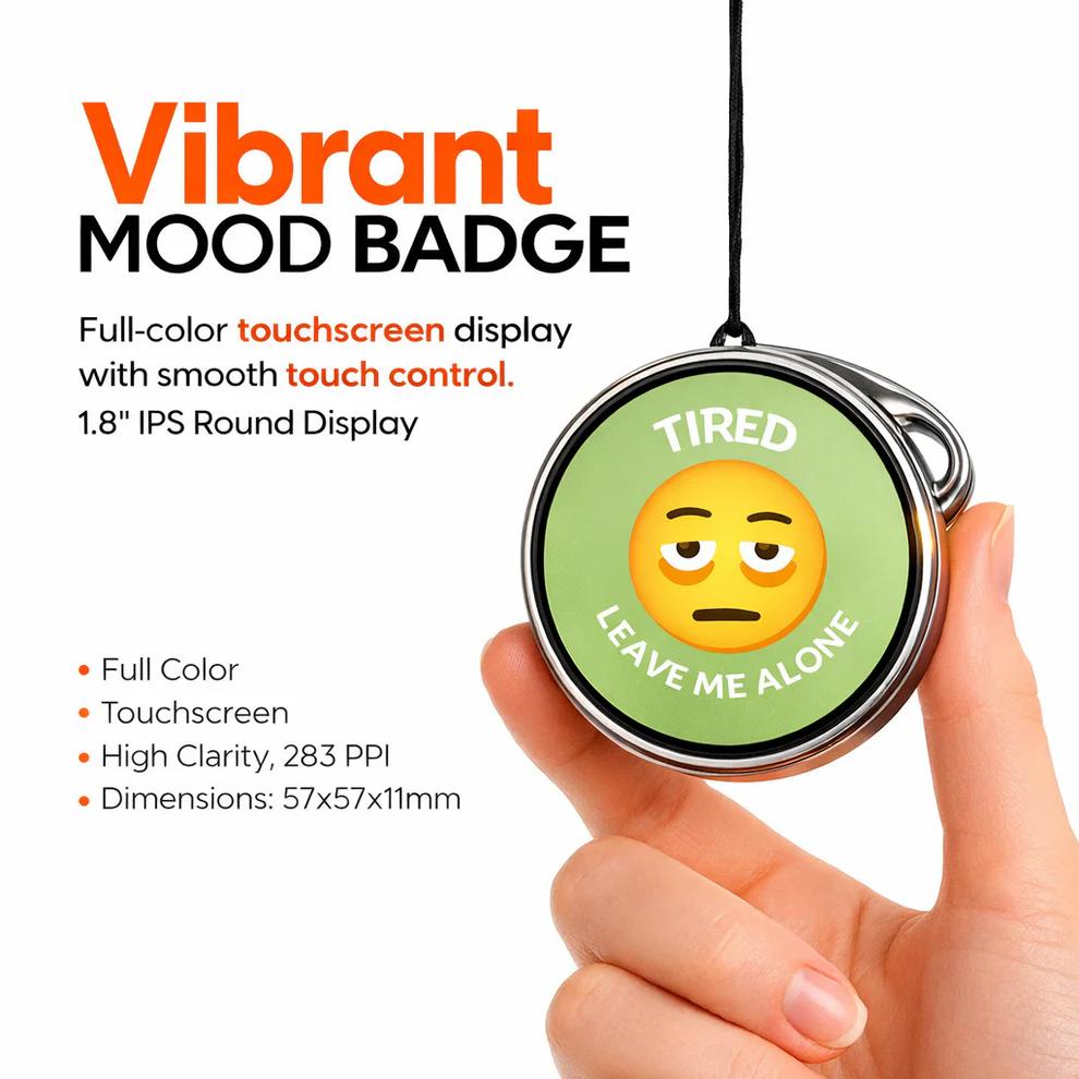 Urbanomax Mood Badge showing a colorful design and branding details, used as a fashion accessory or statement badge.