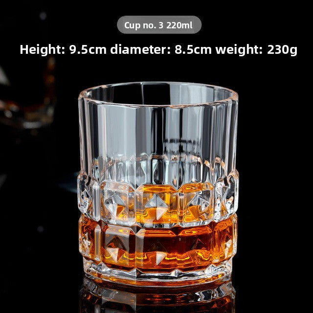 Clear glass whiskey cup with Christmas-themed design, perfect for holiday gatherings and festive occasions.