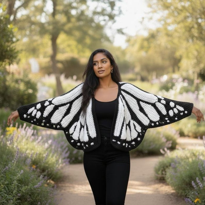 Christmas Monarch Butterfly Knit Cardigan featuring festive holiday motifs and cozy knit fabric, perfect for Christmas wear.