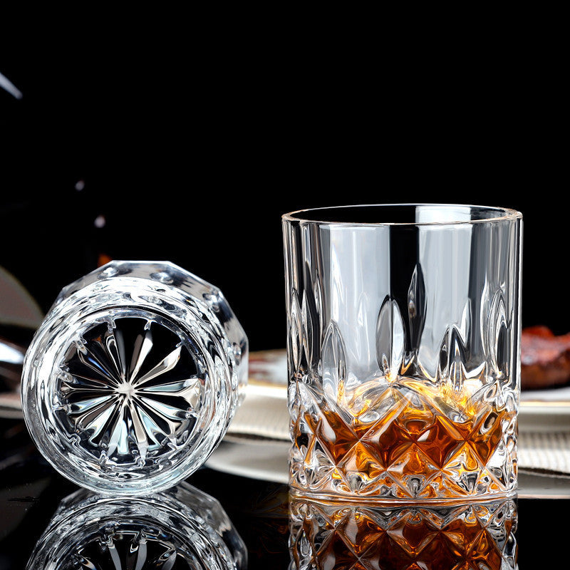 Clear glass whiskey cup with a festive Christmas design, ideal for holiday gatherings and celebrations.