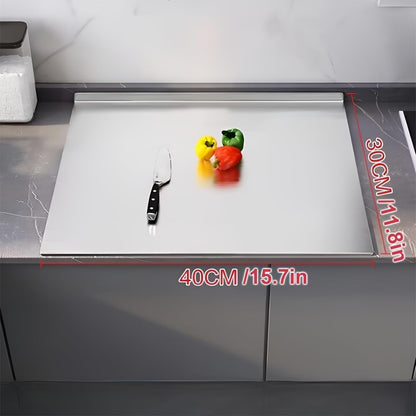 Urbanomax stainless steel cutting board with a smooth, durable surface and clean edges, ideal for food prep.