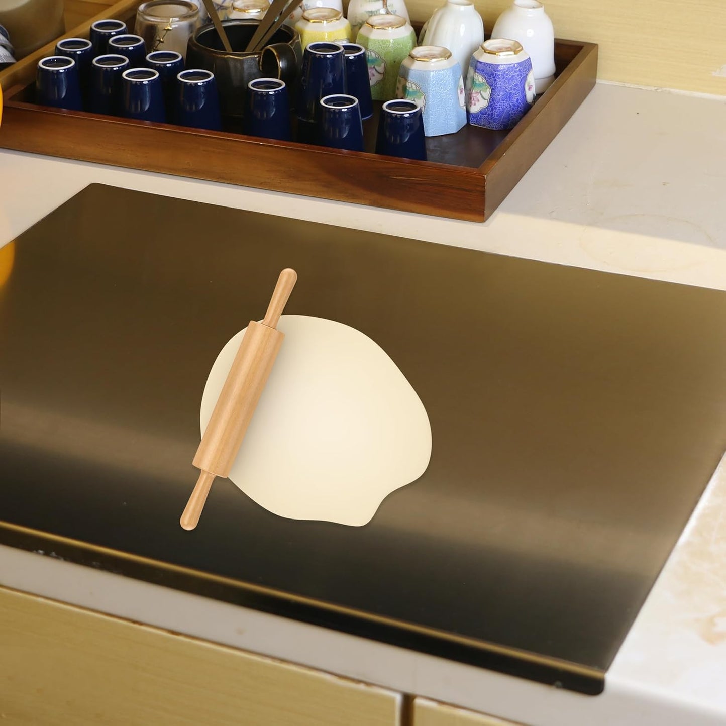Urbanomax stainless steel cutting board with a sleek, durable surface ideal for food prep and kitchen use.
