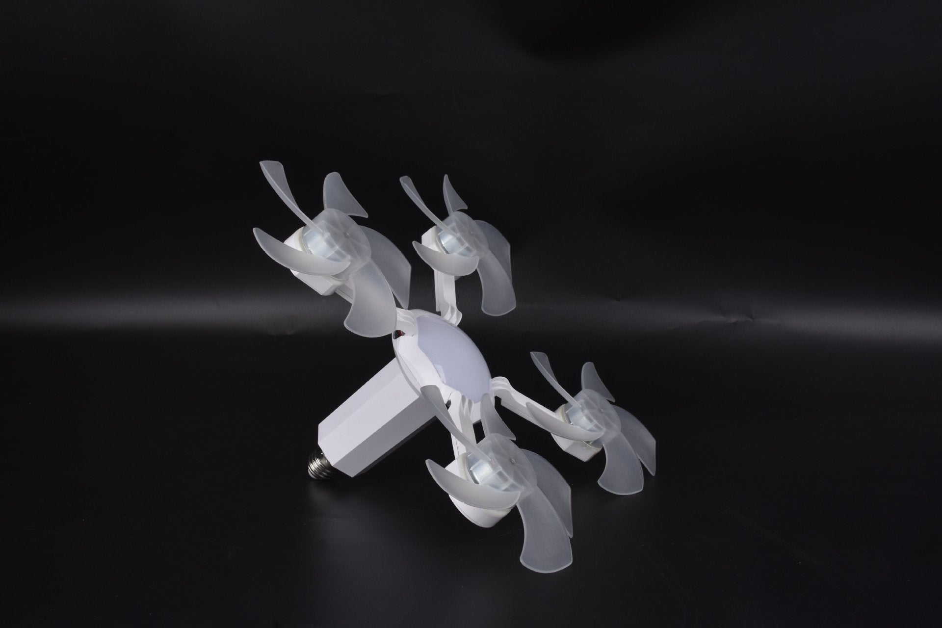 URBANOMAX remote control ceiling fan with integrated light, modern design, mounted on a ceiling with soft lighting in a home setting