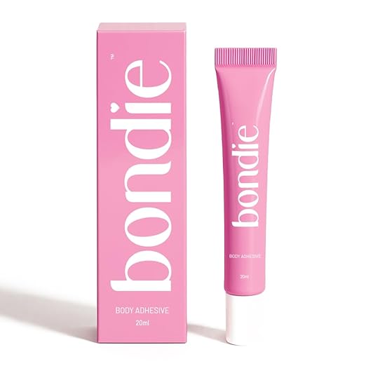 URBANOMAX body adhesive tube with applicator for skin attachment and costume use, shown in a close-up view.