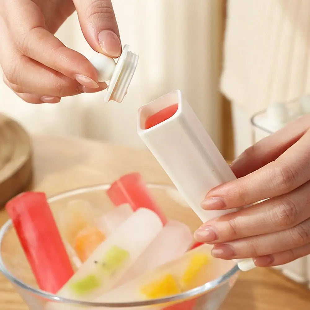 URBANOMAX silicone popsicle mold with lid for making frozen treats, featuring a flexible design and secure cover.
