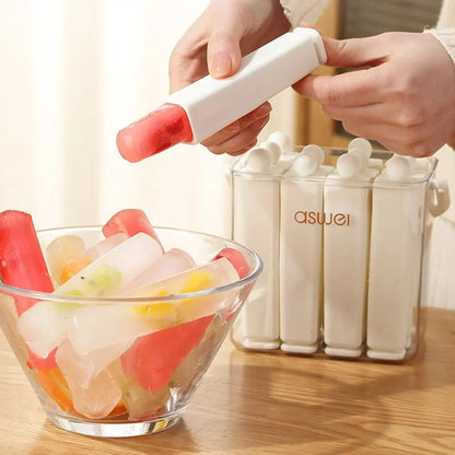 Urbanomax silicone popsicle mold with lid, showing four colorful frozen treats ready for making homemade popsicles.